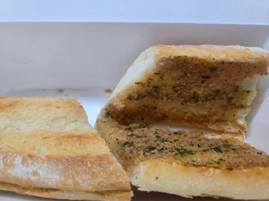 Cross-section of the cod roe baguette showing plenty of cod roe