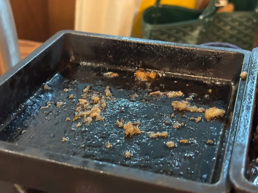 Gyukatsu grilled over a brazier with butter