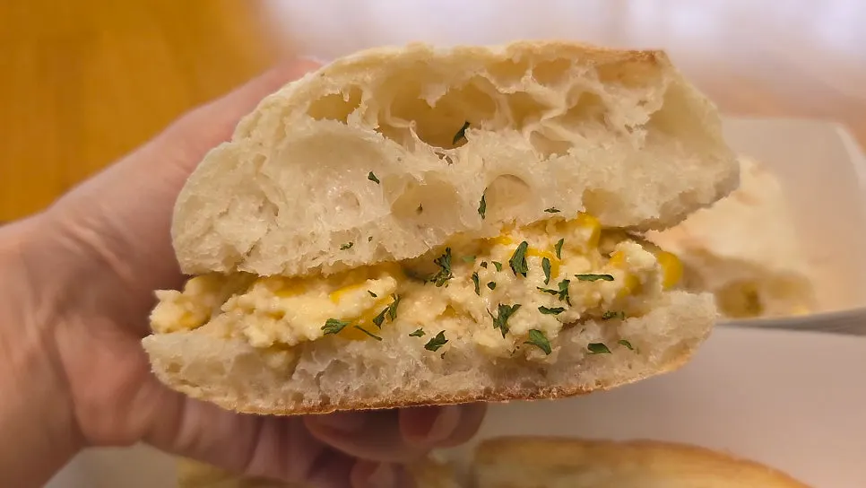 Corn tofu cream cheese ciabatta sandwich