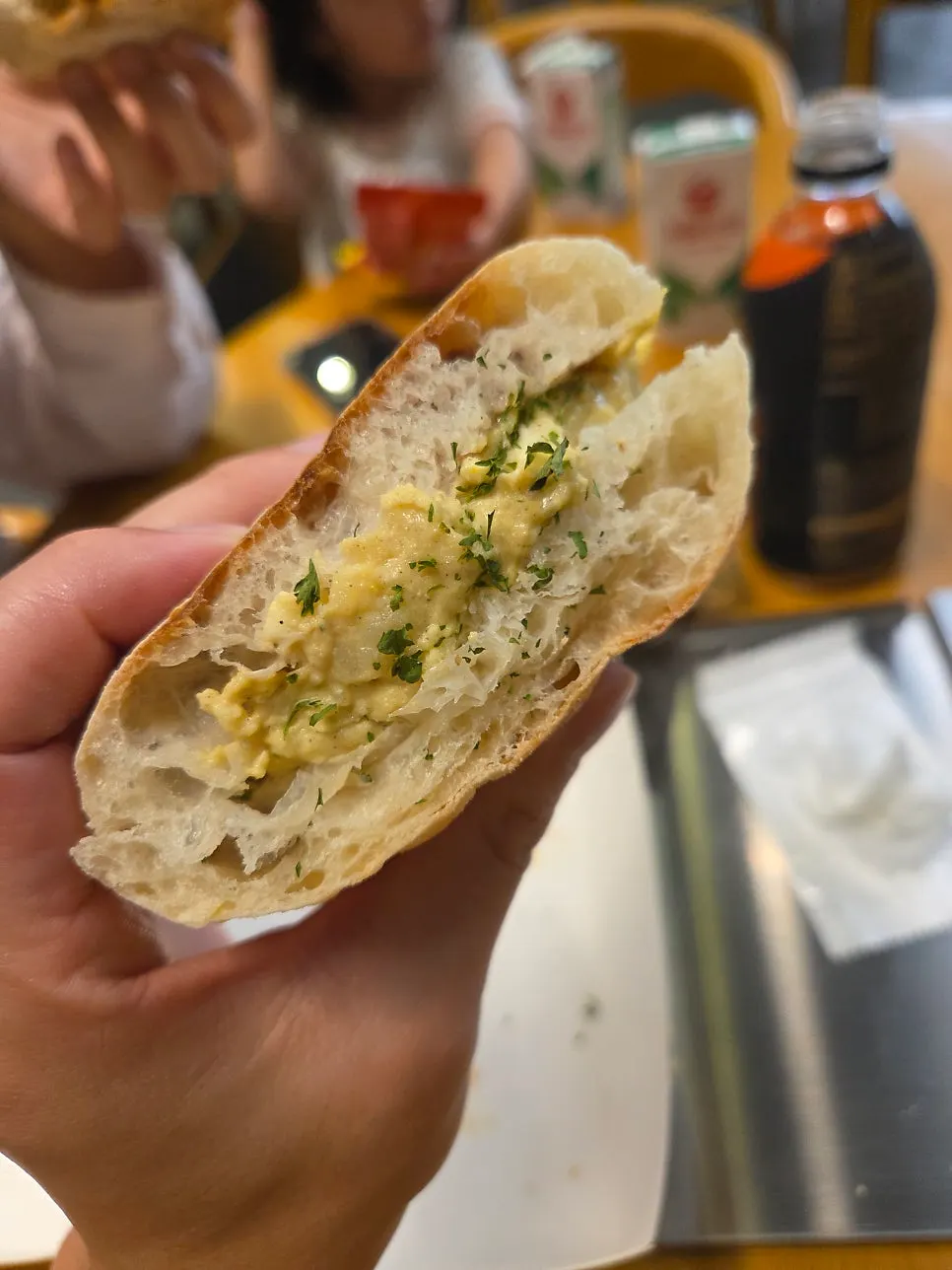 Cross-section of the egg potato sandwich showing strawberry jam layer