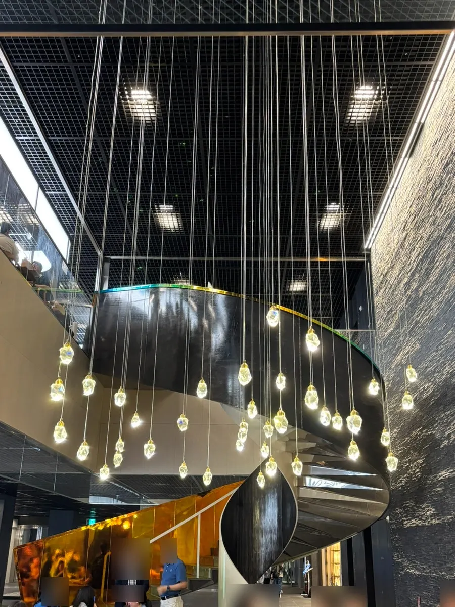 Underground passage with a chandelier in front of the store