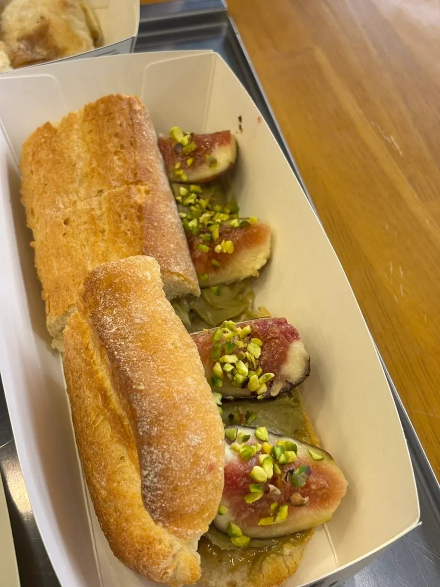 Cross-section of the baguette topped with figs and fig jam