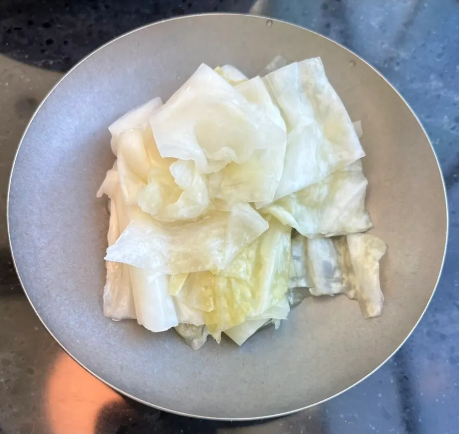 Side dishes of napa cabbage kimchi and baek-kimchi