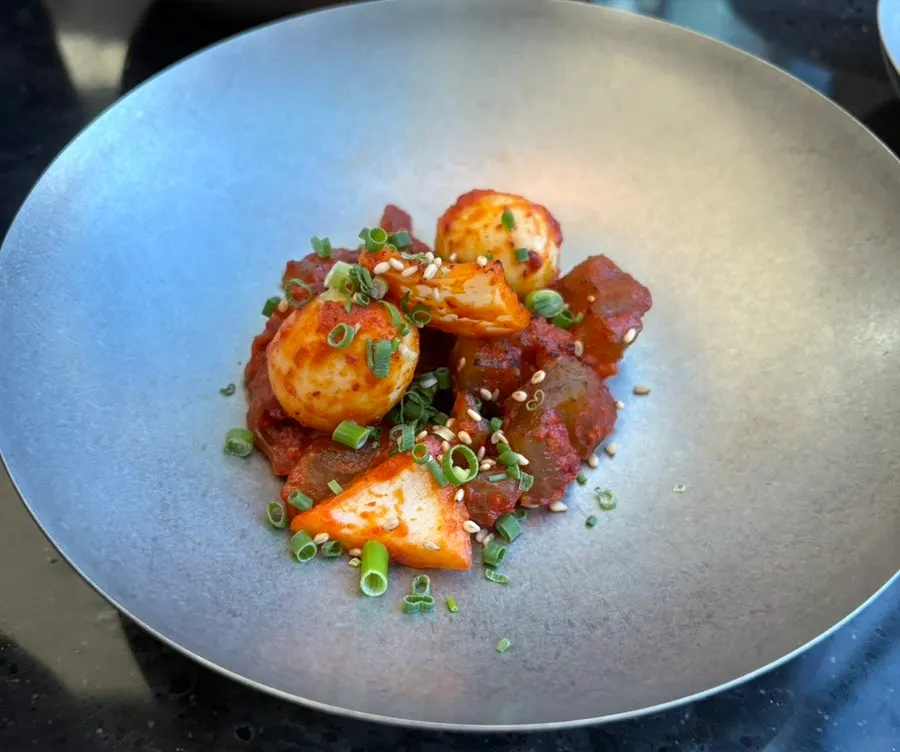 Gonyi muchim placed alongside the shabu-shabu table