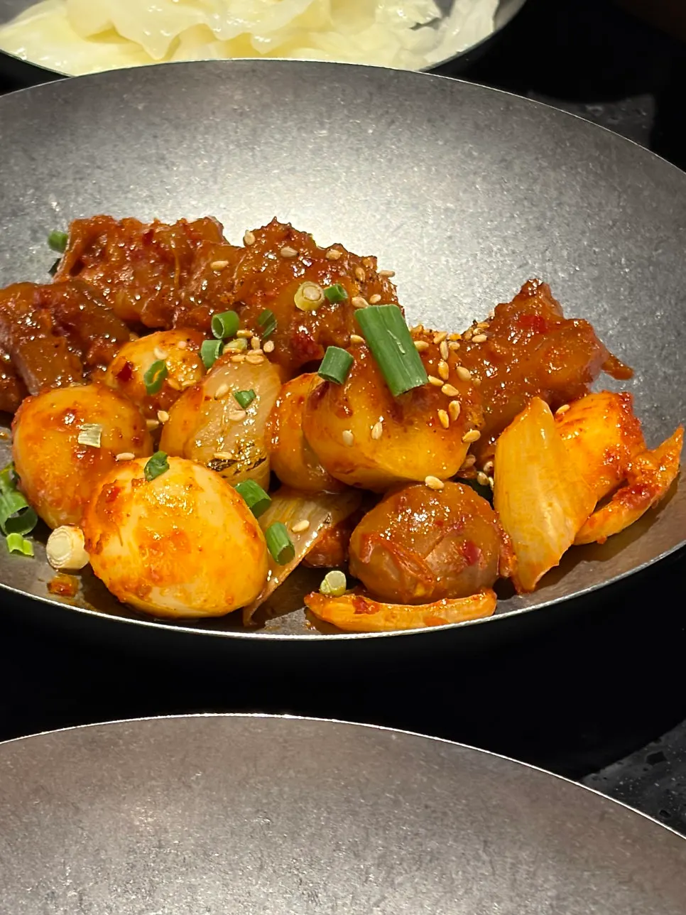 Meat cooked in the broth served with sauce
