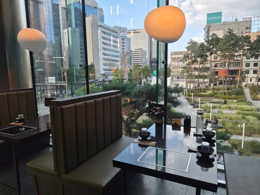 City view of downtown Seoul through the floor-to-ceiling windows
