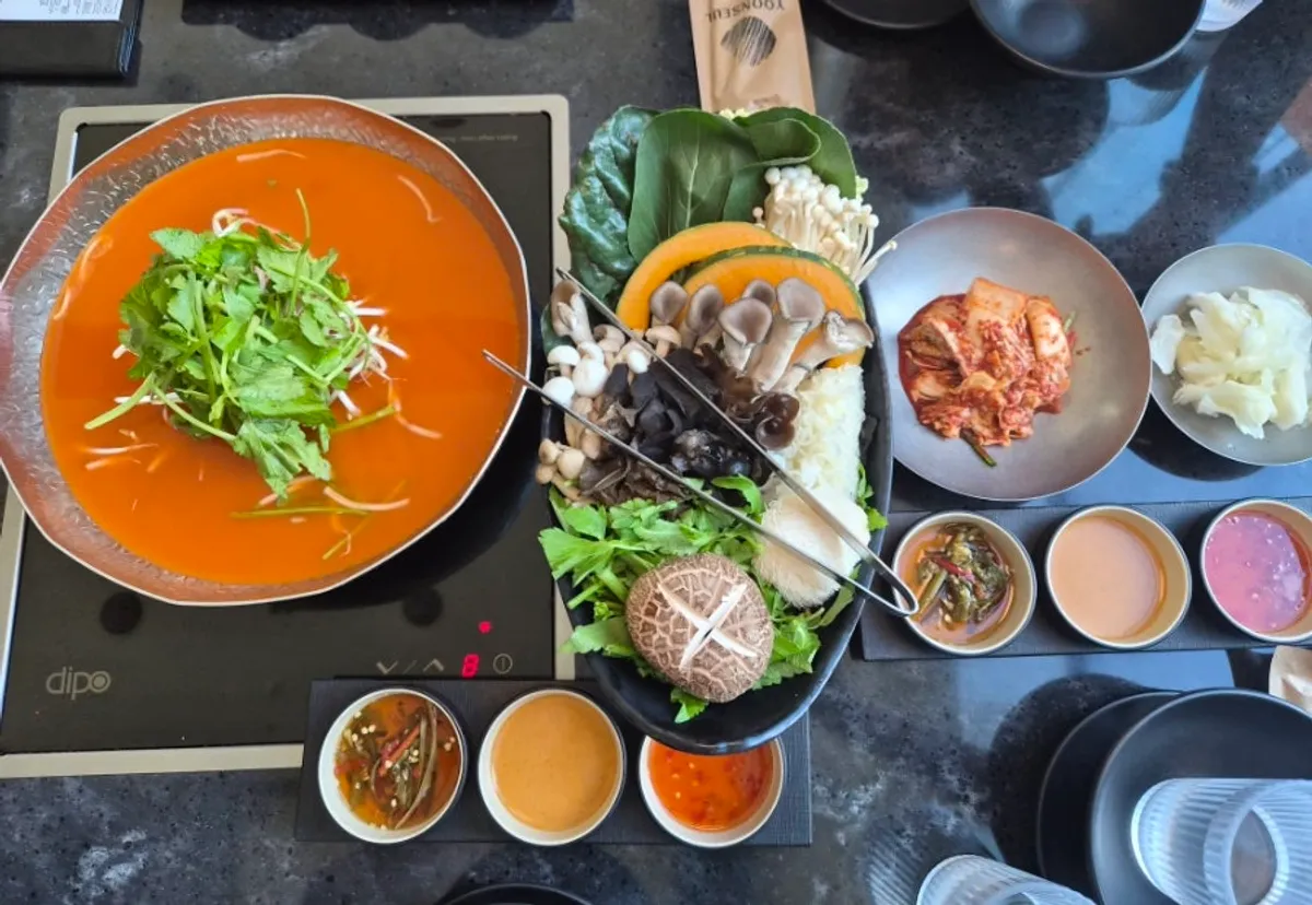 Pot of spicy, fiery mushroom broth