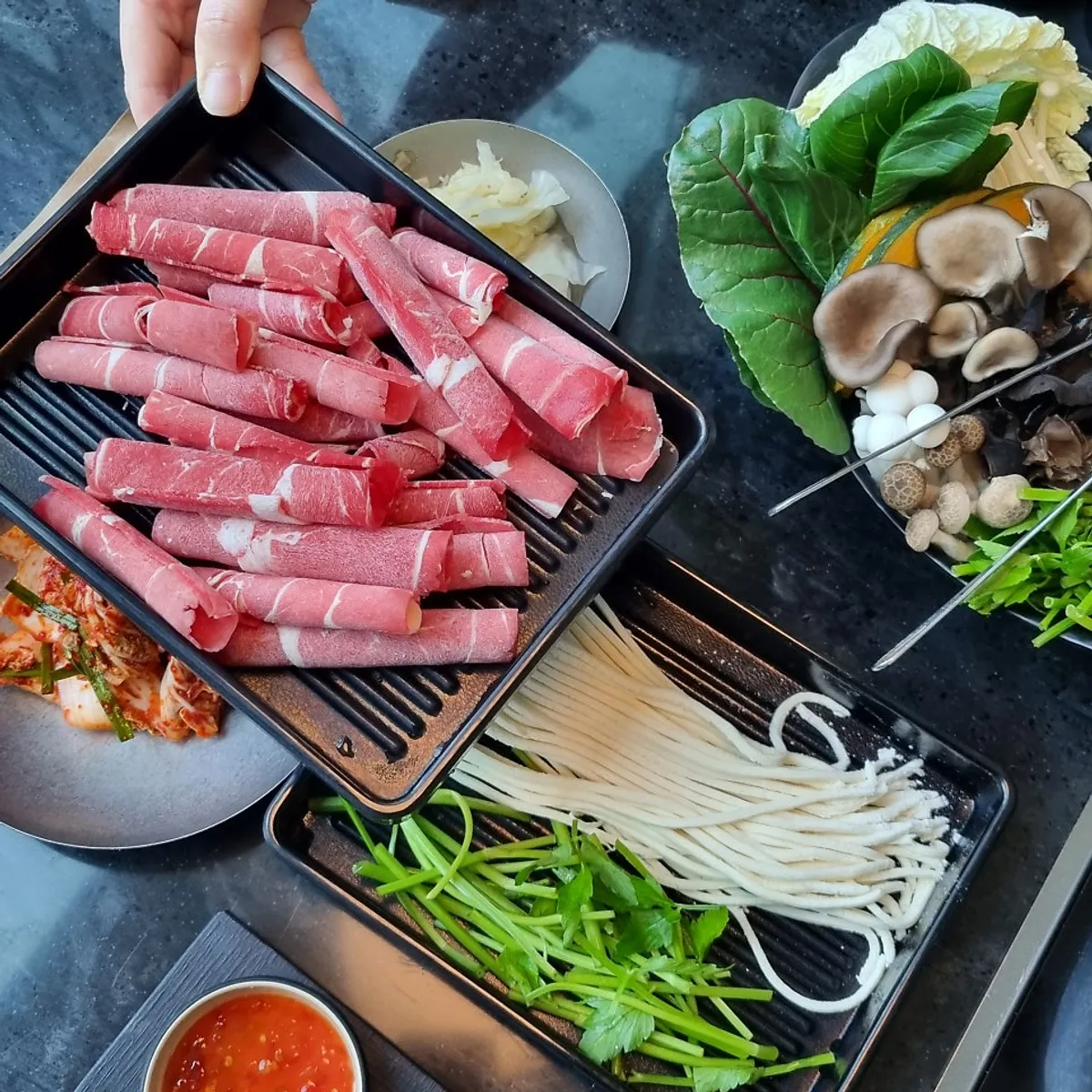 Plate of meat and vegetables for shabu-shabu at Yunseul