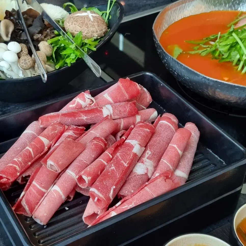 Pot of spicy broth shabu-shabu at Yunseul