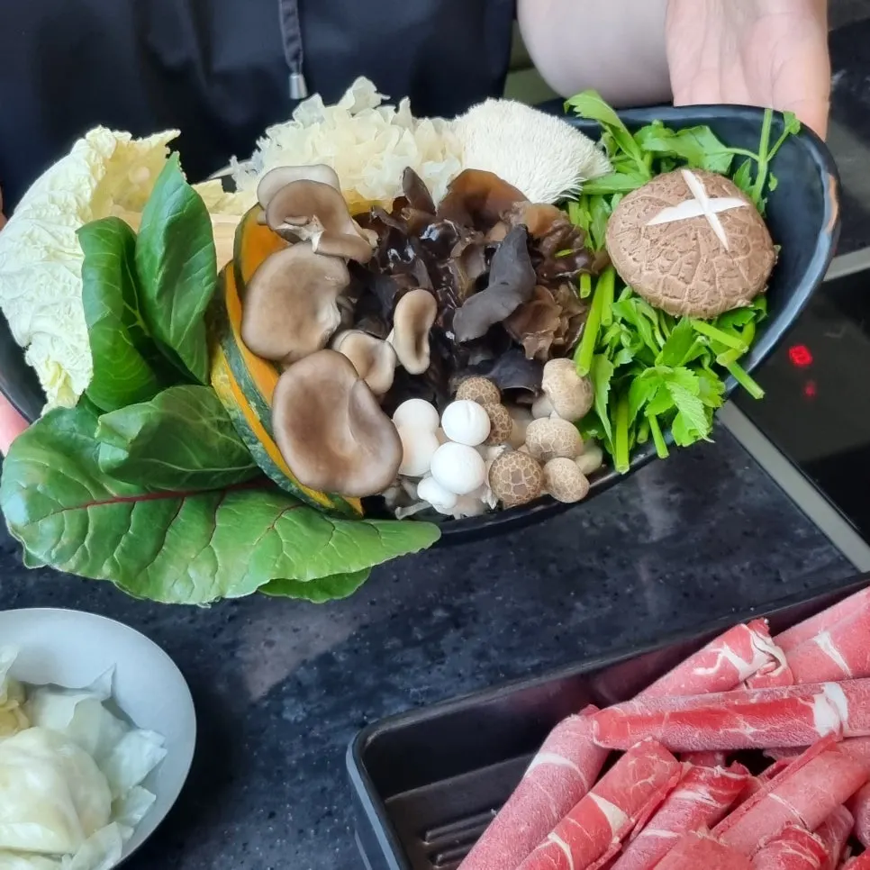 Beef and fresh vegetables plated at Yunseul