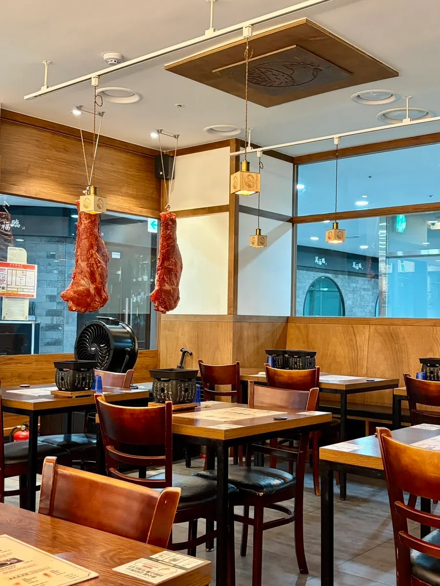 Dining hall with many tables at Ichigyu Seoul Station Branch