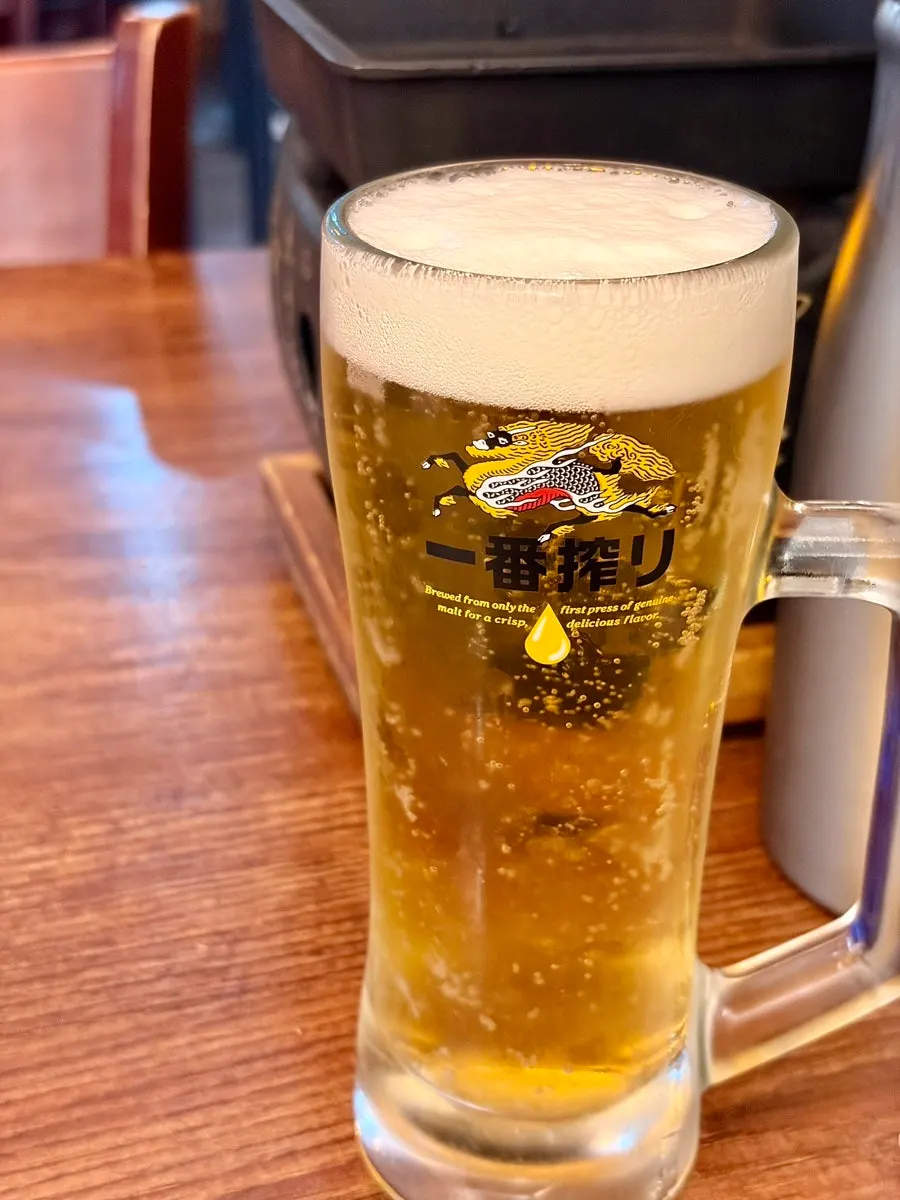 A glass of 420ml Kirin draft beer