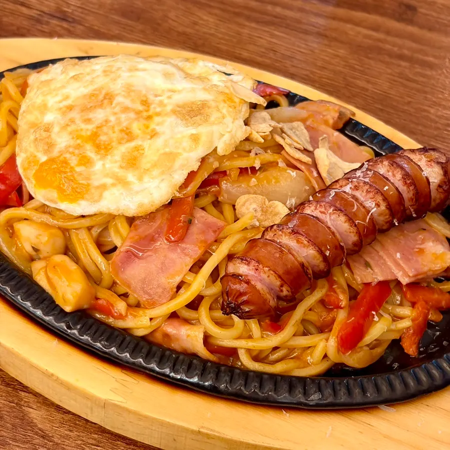 Close-up of gyukatsu dipped in sauce