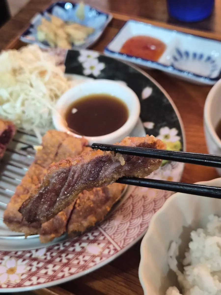 Cooked gyukatsu served with rice