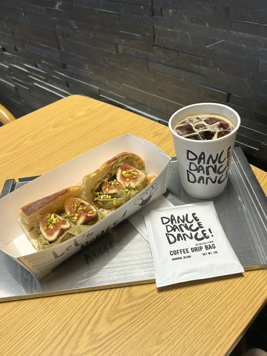 Americano and fig pistachio baguette with the free drip bag