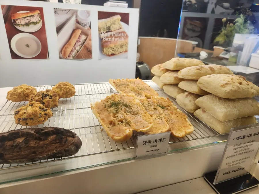 Dessert display case with pollack roe baguette and scones