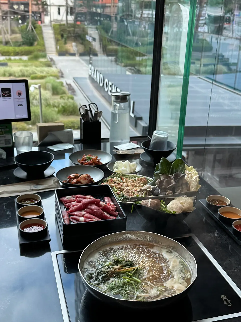 Shabu-shabu meal set up at the window seat