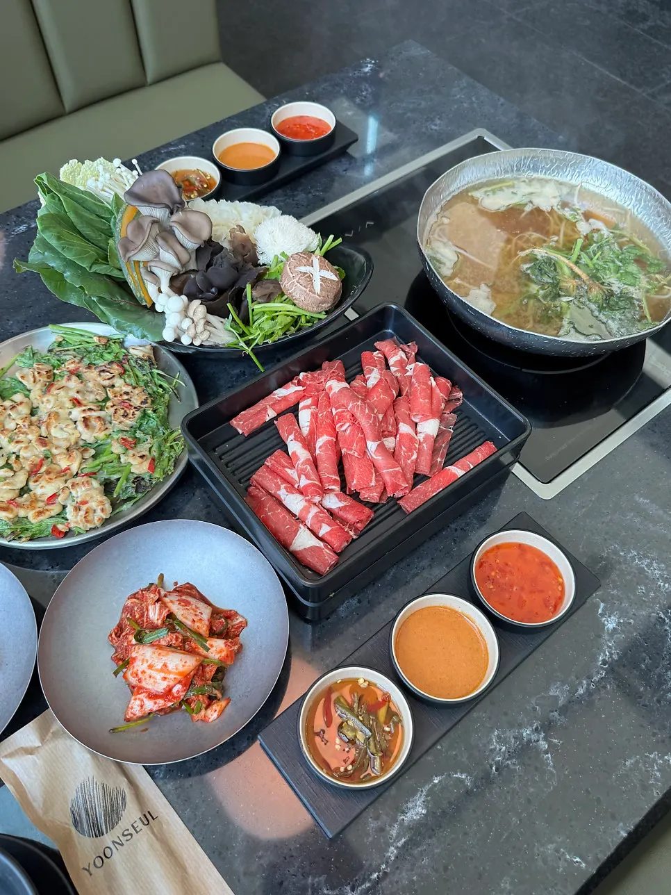 Shabu-shabu meal set up at the window seat