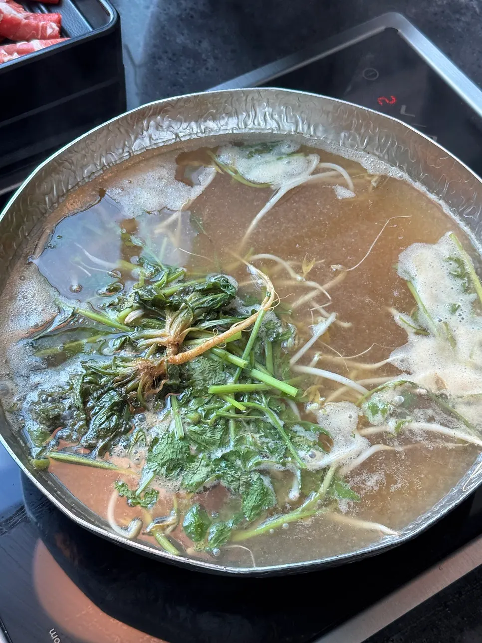 Shabu-shabu setup at the reserved window seat