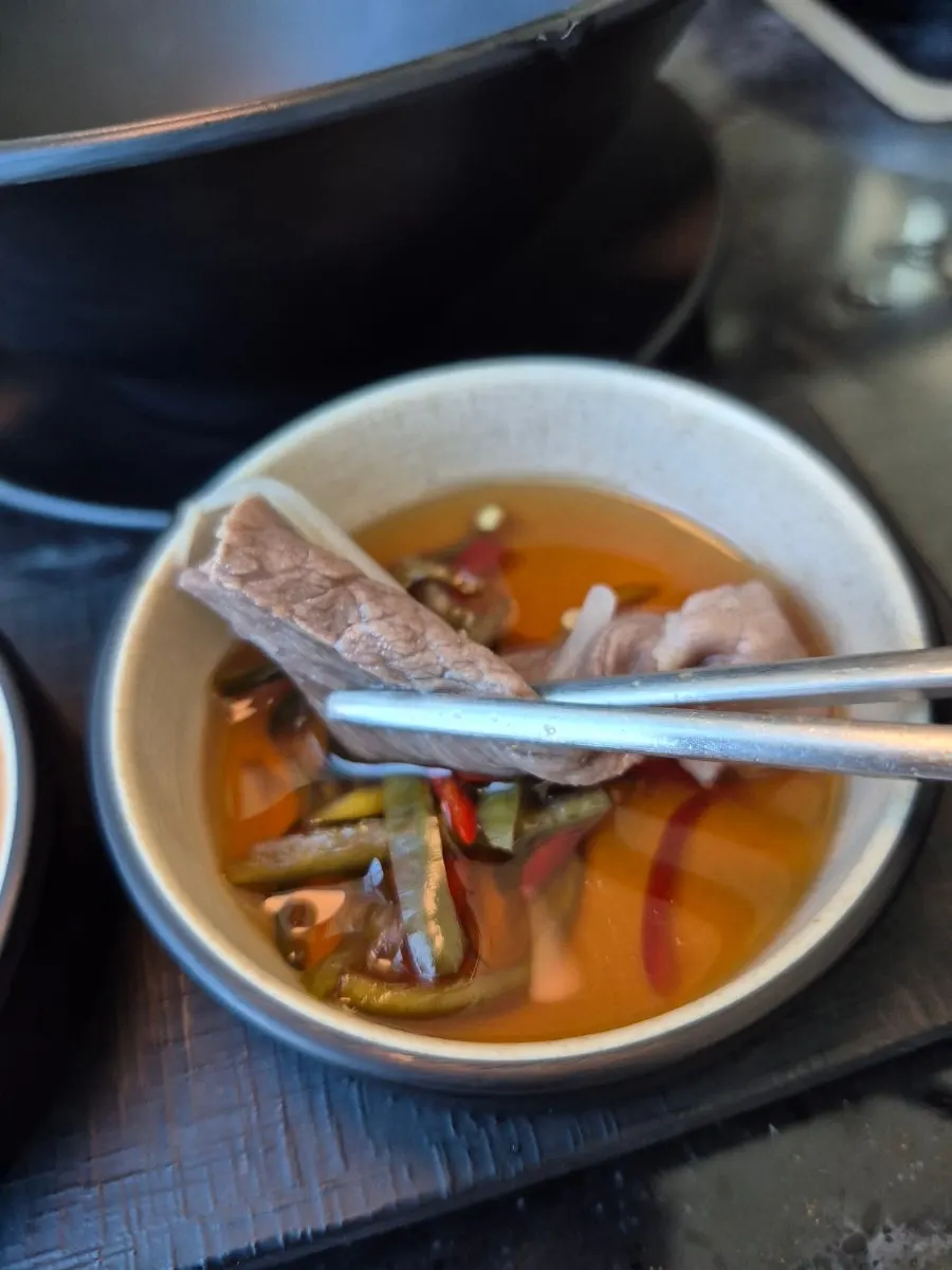 Clear anchovy-broth shabu-shabu meal
