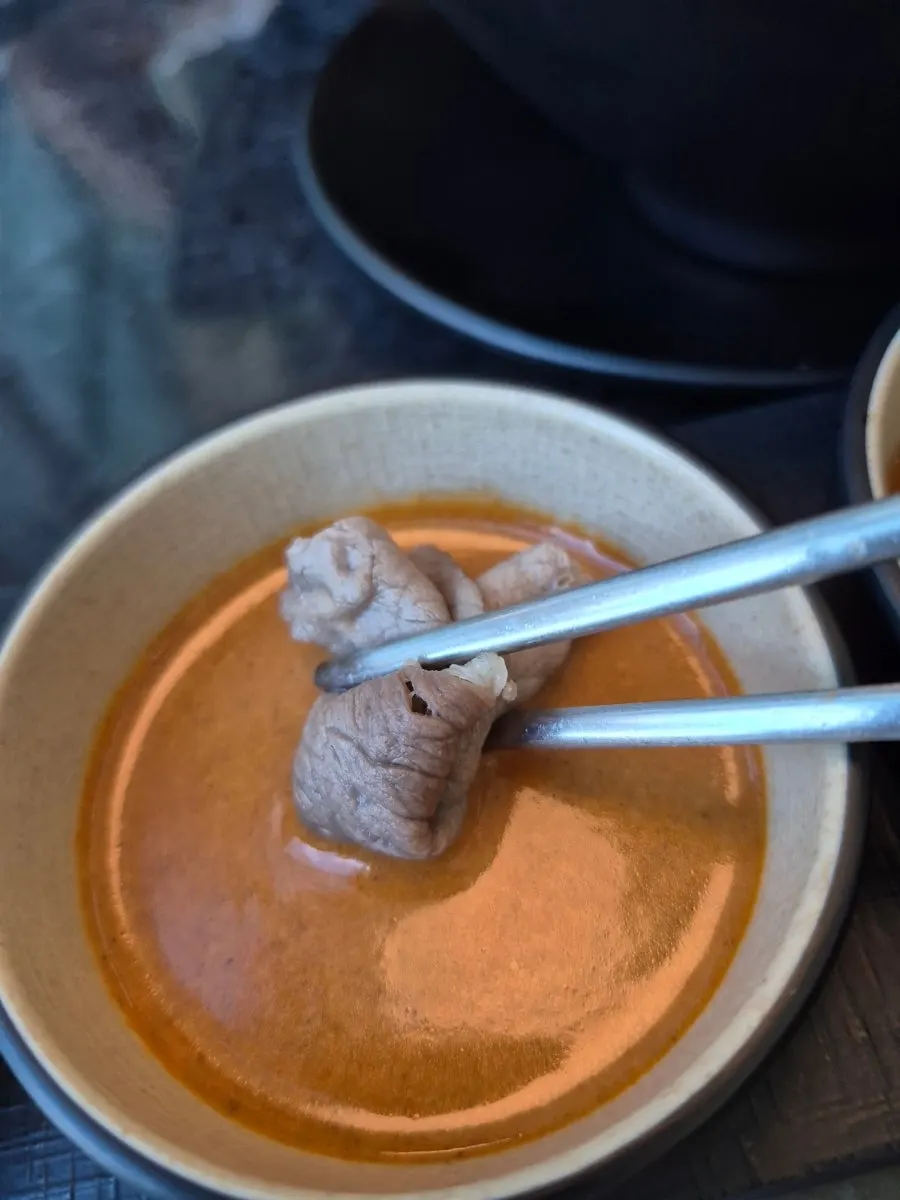 Clear anchovy-broth shabu-shabu meal