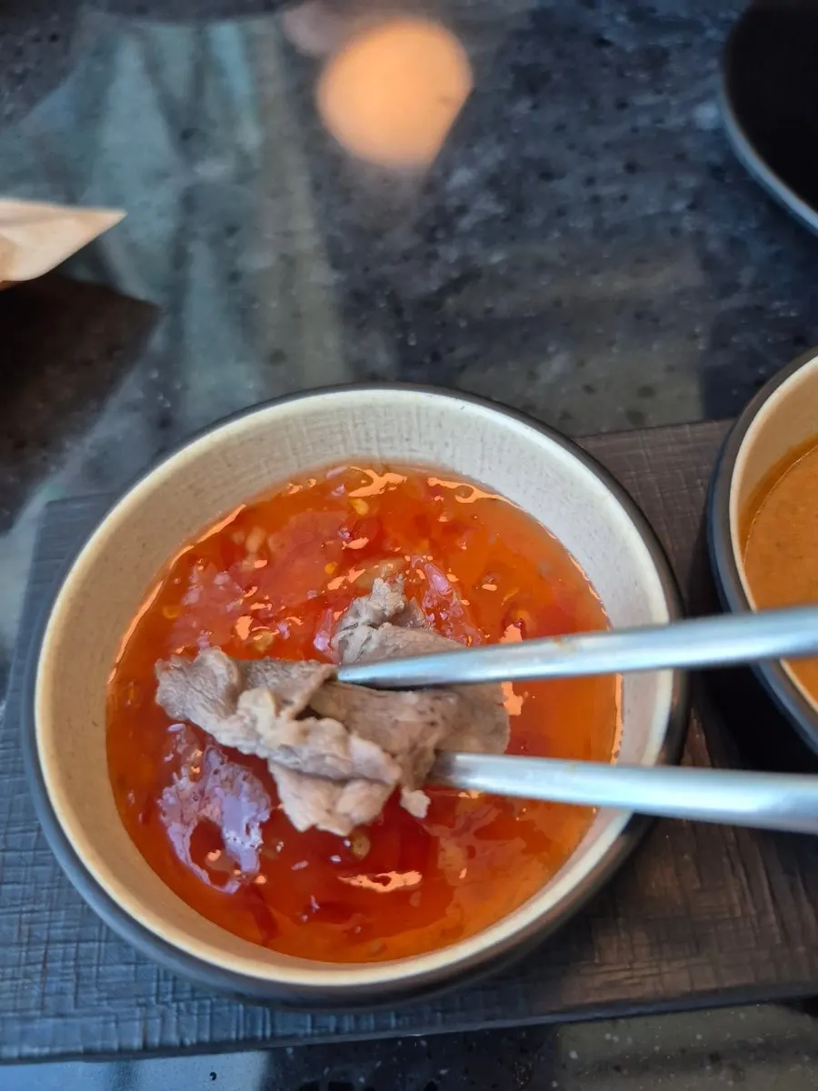 Clear anchovy-broth shabu-shabu meal