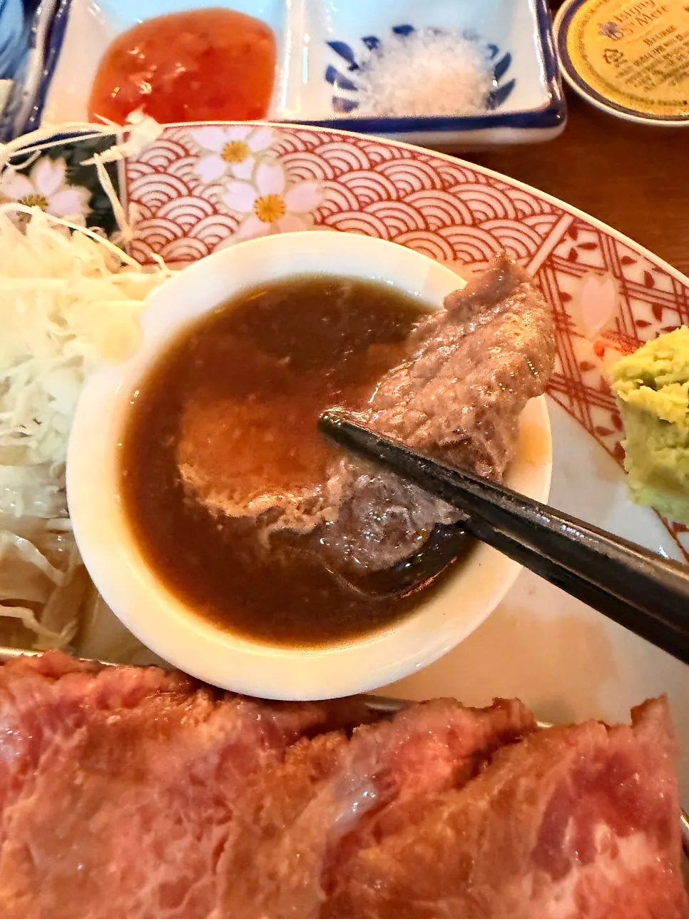 Sirloin steak dipped in sauce