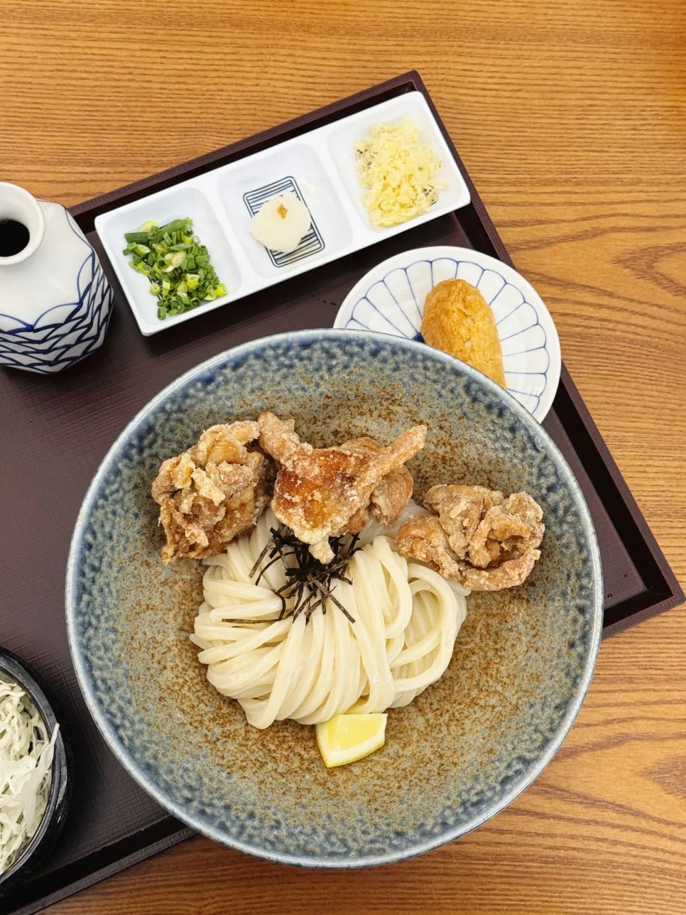 Bukkake udon with chicken tempura and toppings