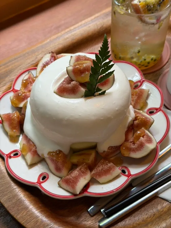 Two thick soufflé pieces piled high with fig