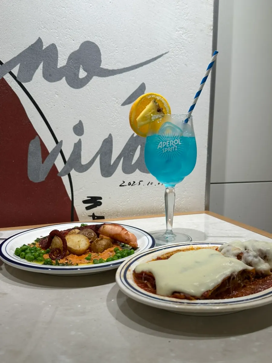 Cheese lasagna and octopus dish meal