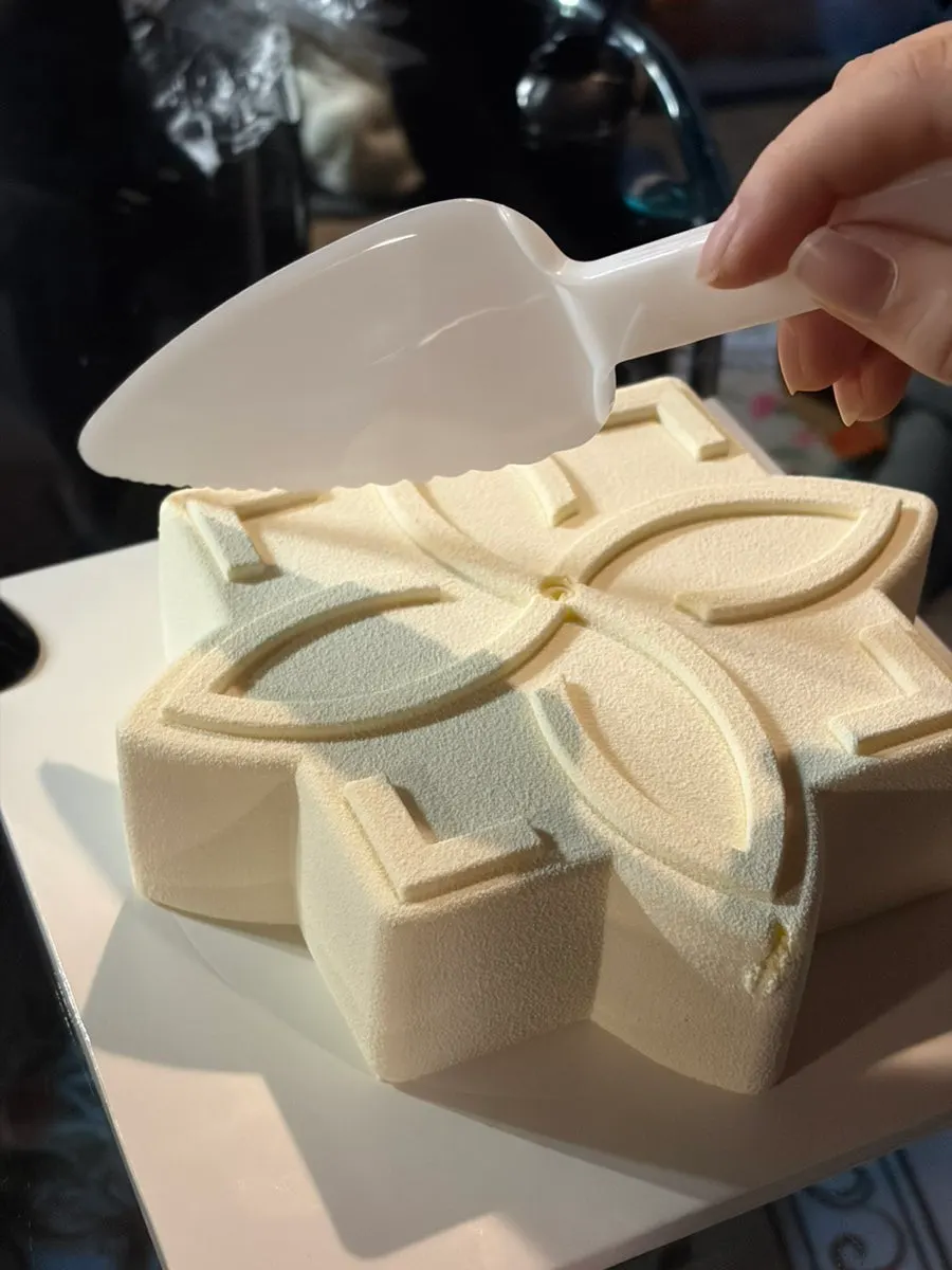 White mousse cake with a powdery texture