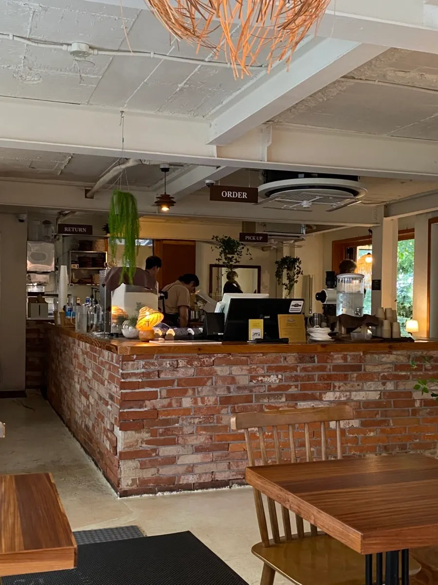 Stairs leading up to the first floor of the café