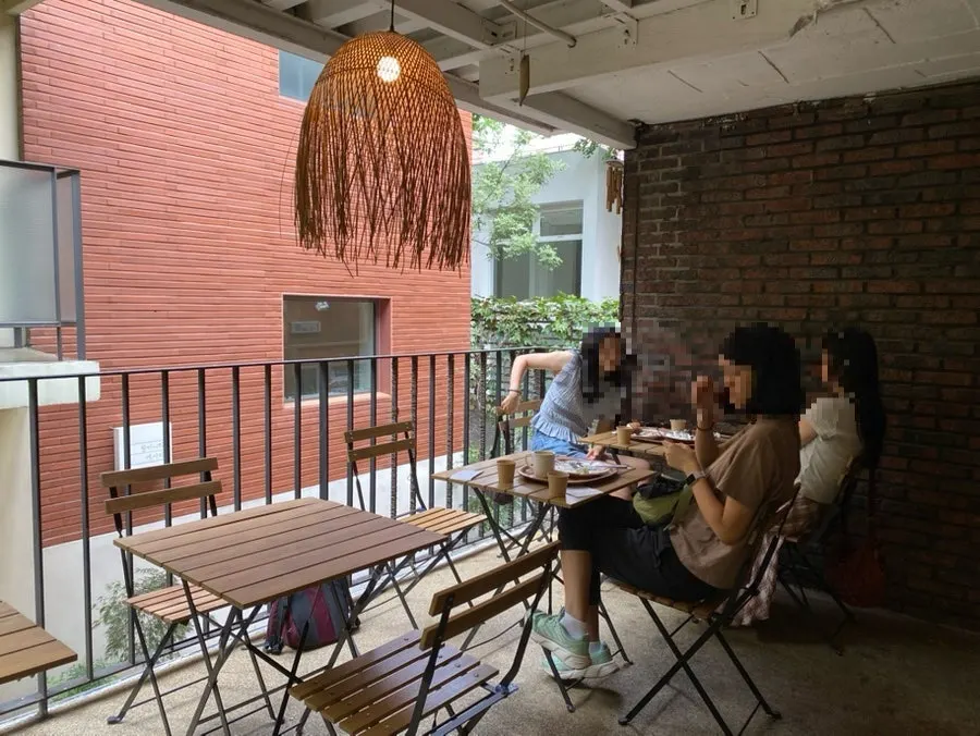 Café space leading out to the first-floor terrace