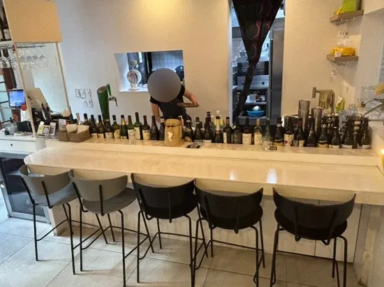 Wide shot showing all of Huirit's seating