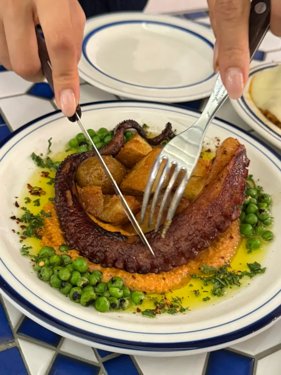 Tender octopus with its accompanying sauce