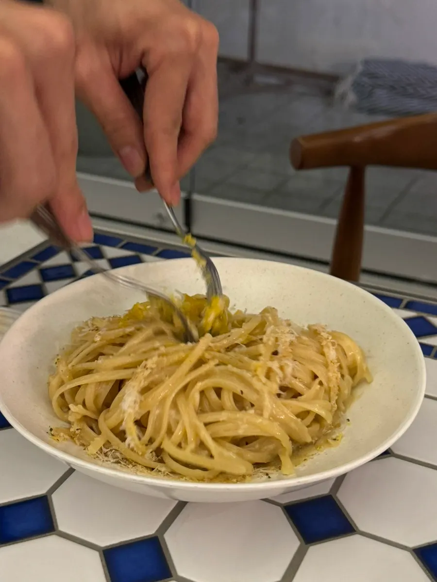 Close-up of the anchovy carbonara noodles