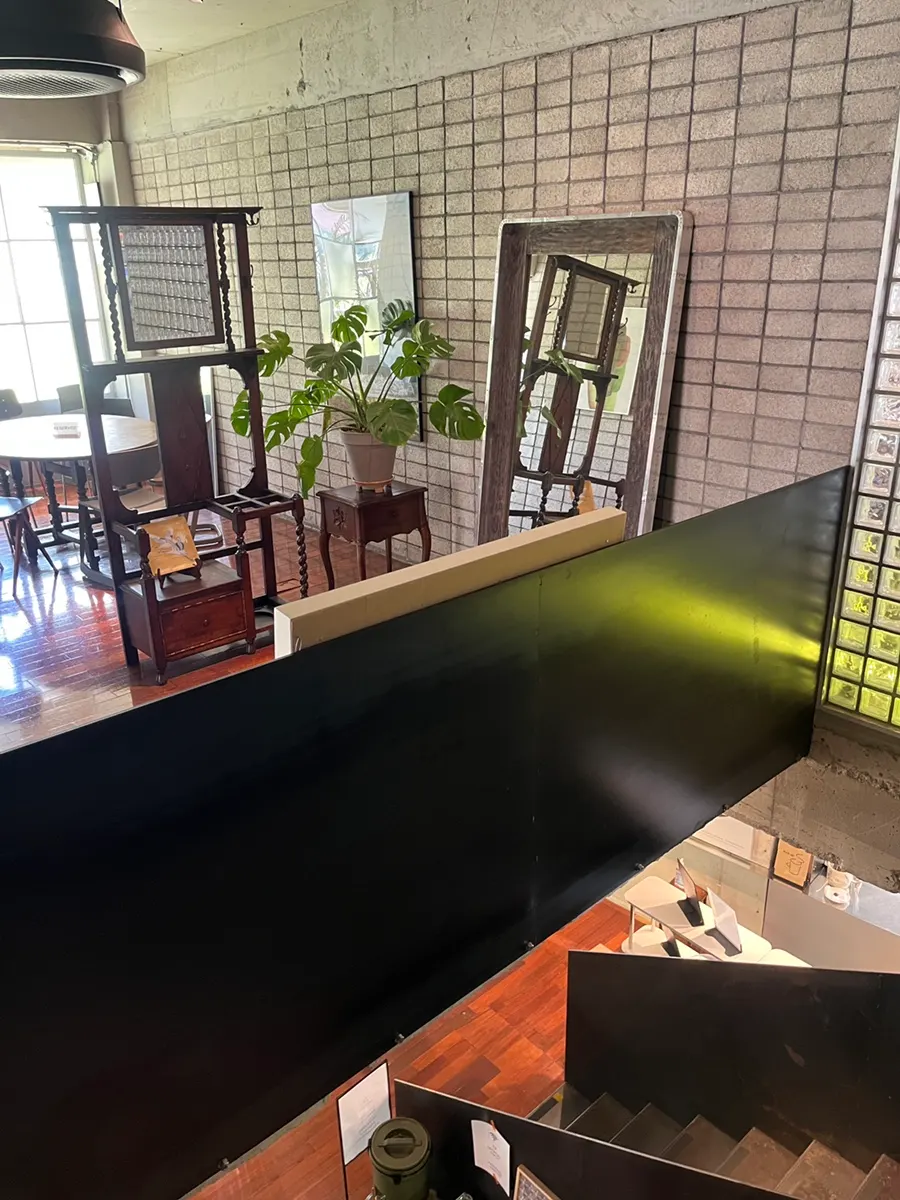 Café space with light streaming through full glass windows