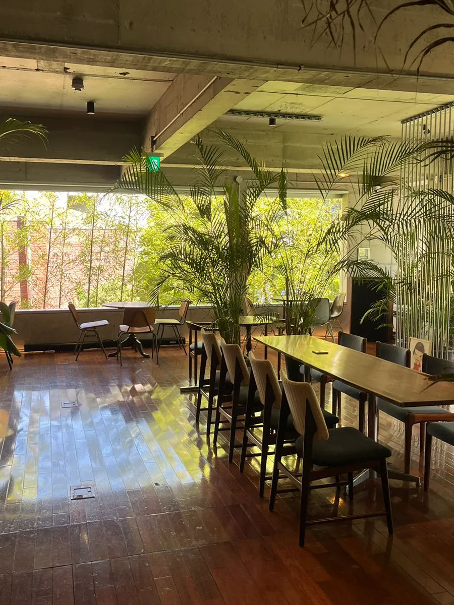 Café hall seating with wide table spacing