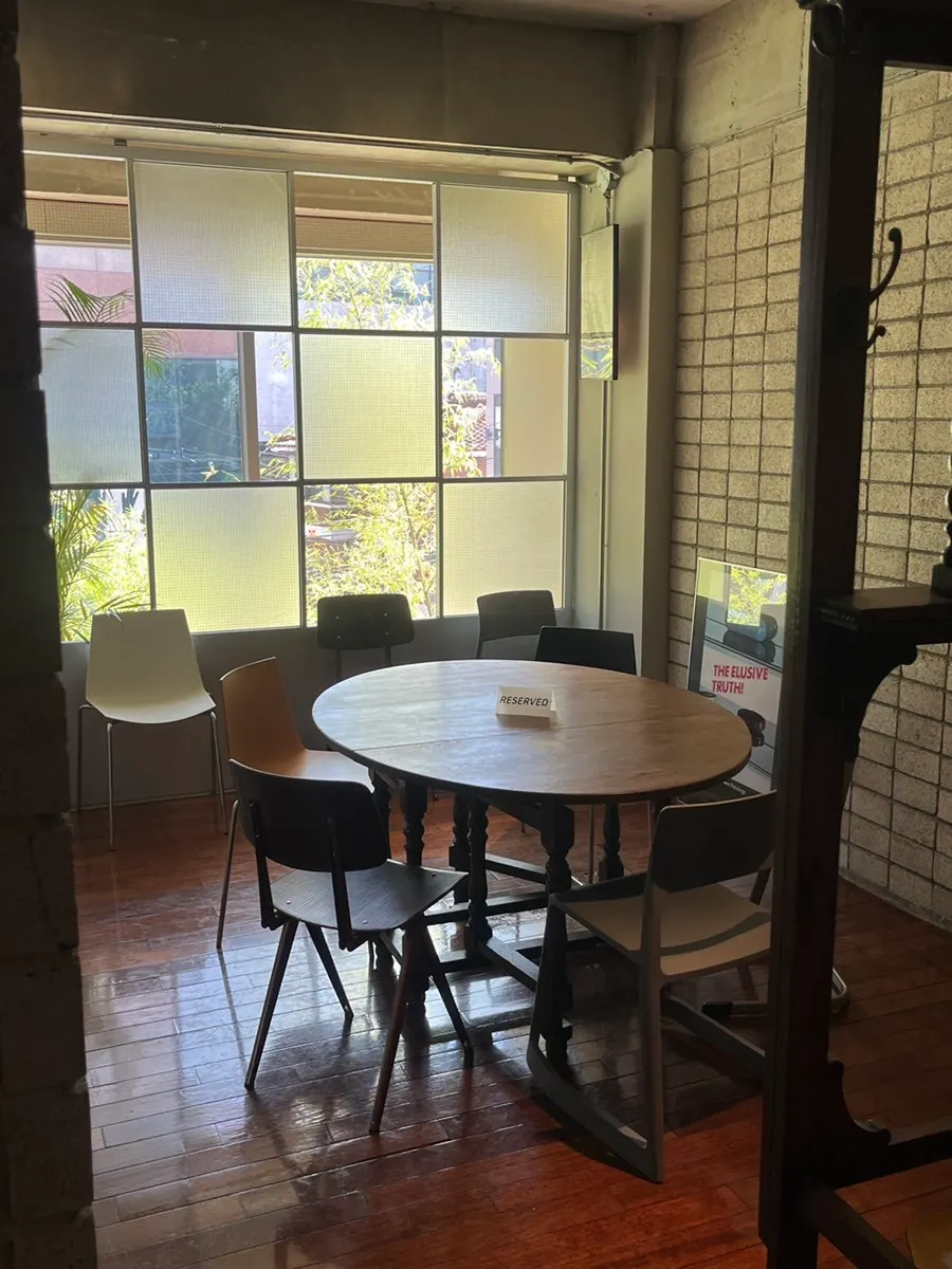 Interior view with window seating and full glass windows