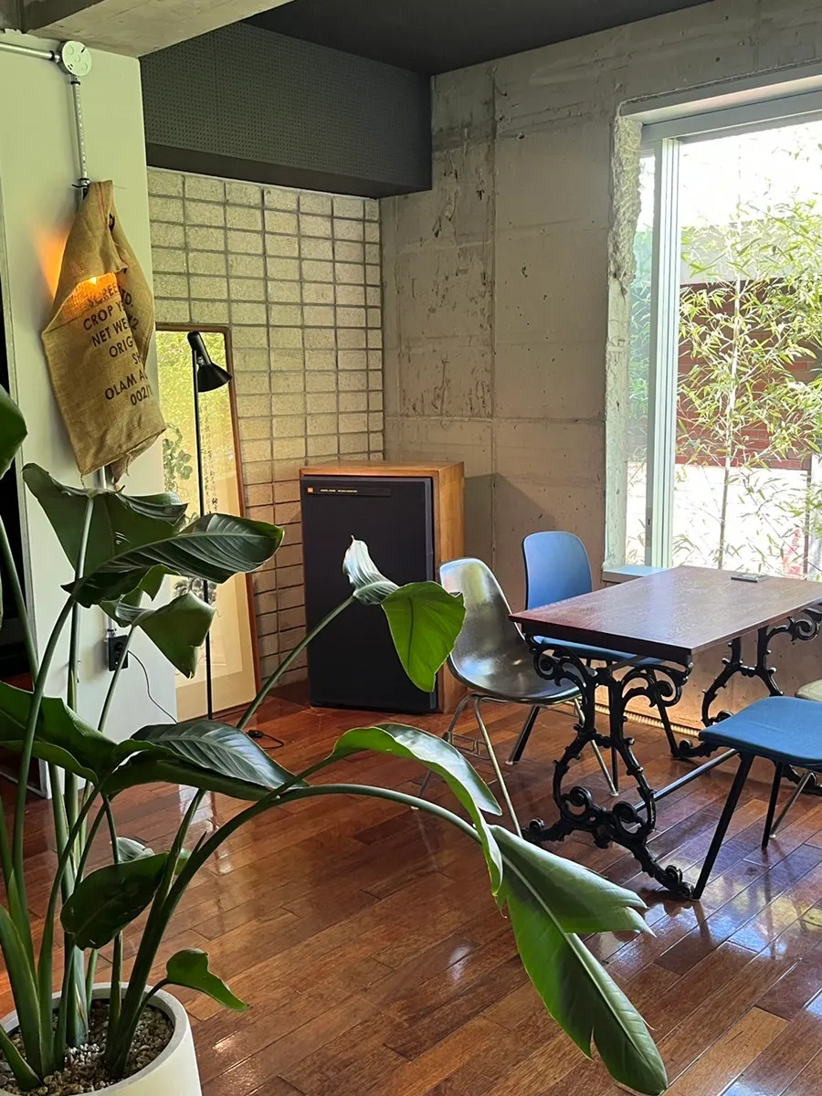 Café tables and chairs with generous spacing