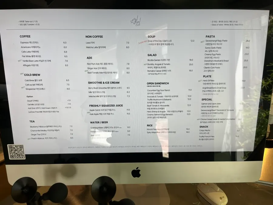 Brunch and drink menu board by the counter