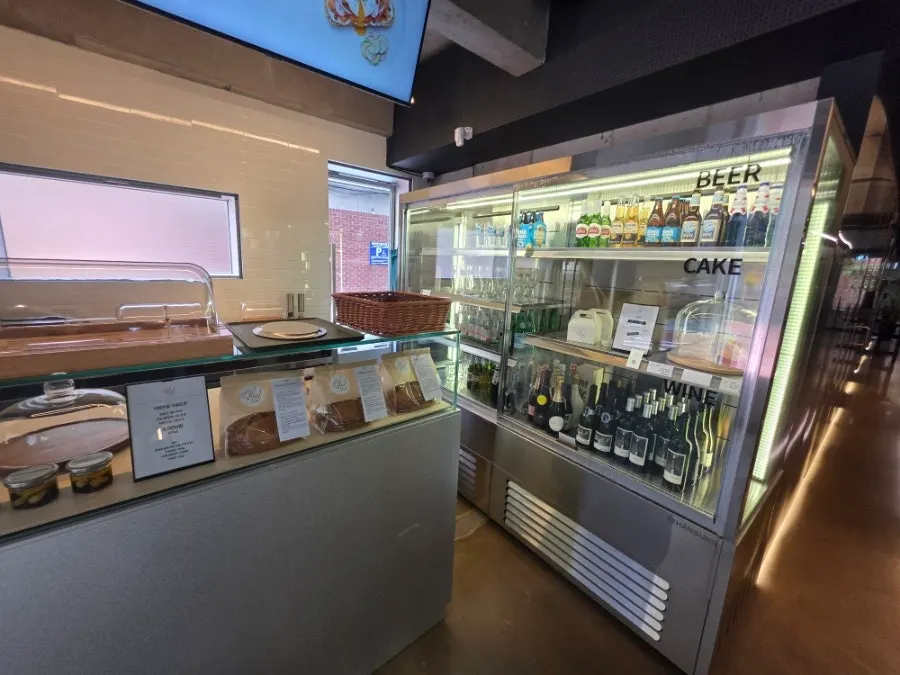 1st floor fridge display case with cakes and drinks