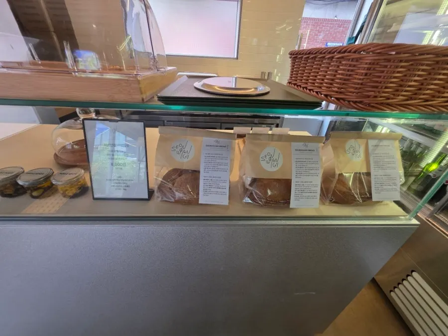 1st floor café seating near the display case at Seowon Angil