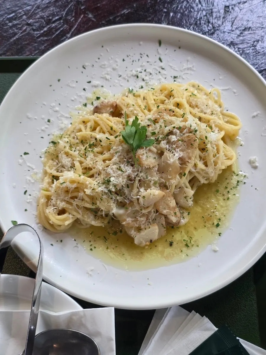 Sunny Garlic Pasta topped with grated cheese