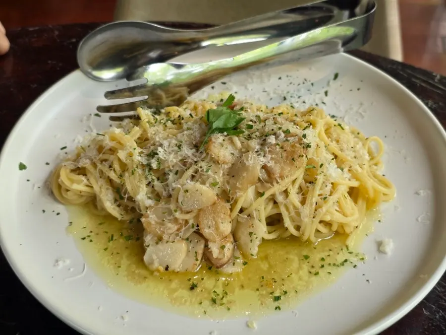 Cross-section of the Sunny Garlic Pasta showing the moist sauce