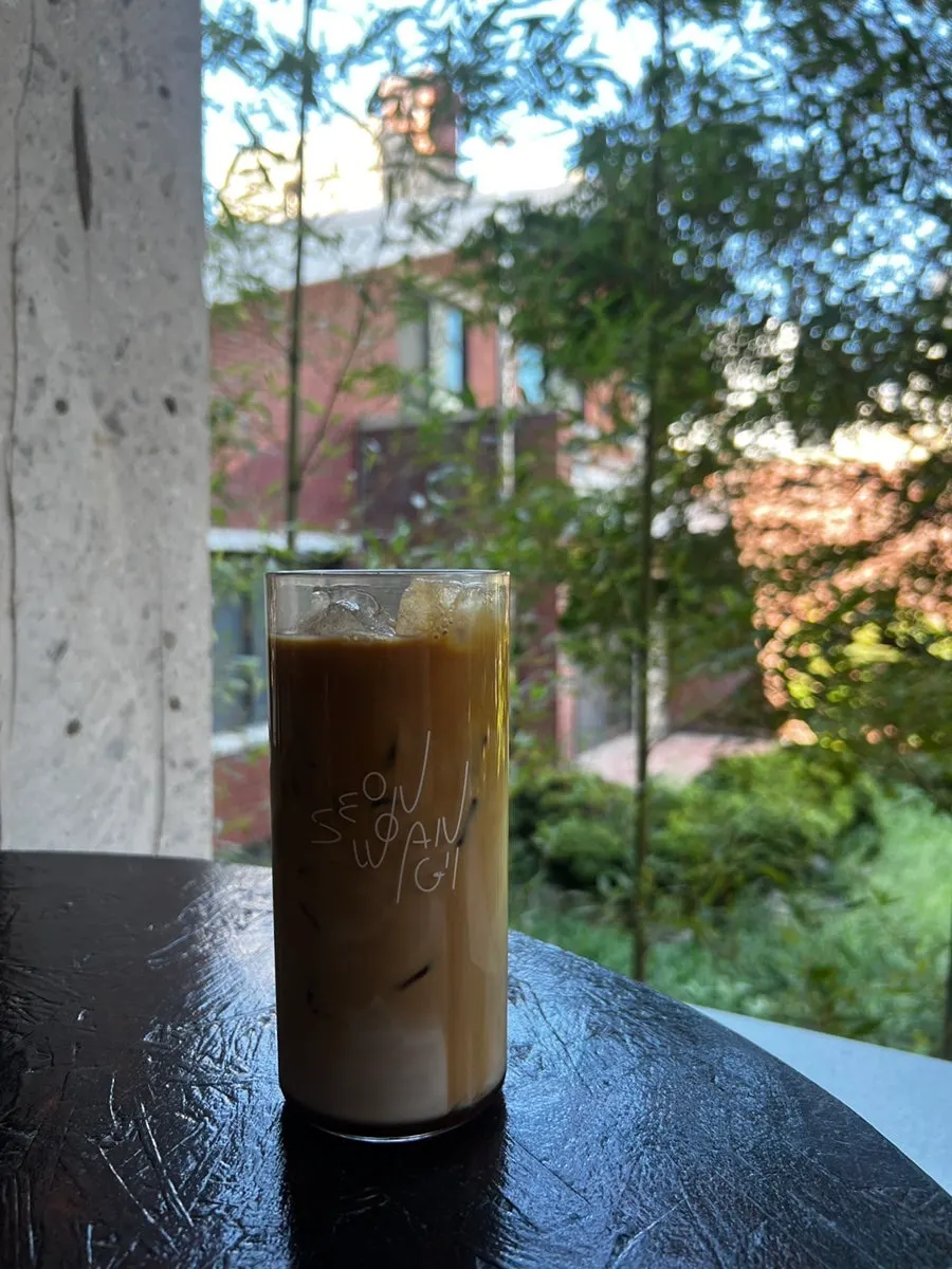 A glass of iced vanilla bean latte