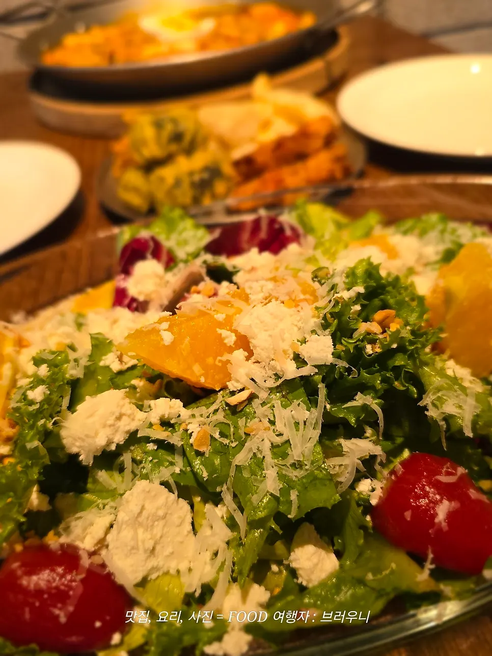 Garden salad topped with house-made ricotta cheese
