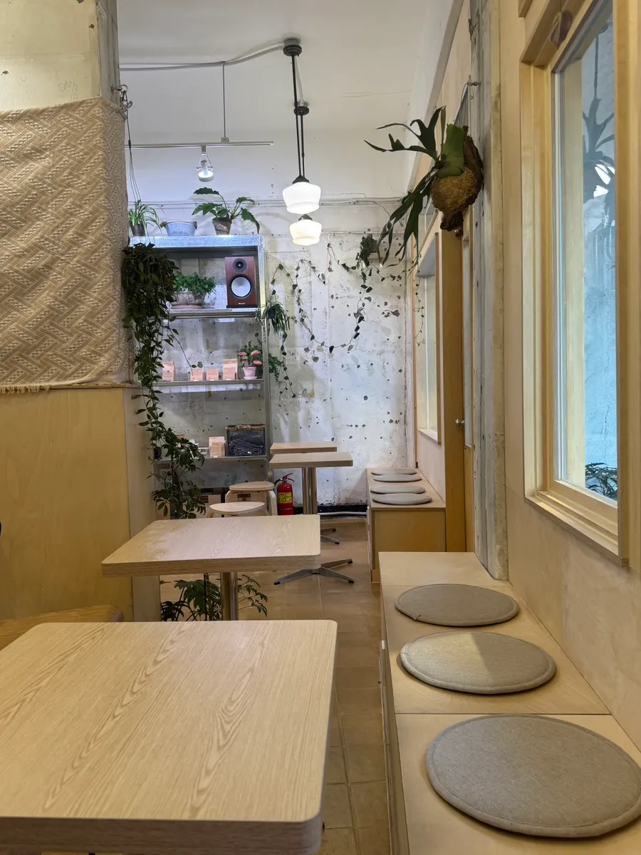 Sese Coffee's outdoor seating at sunset