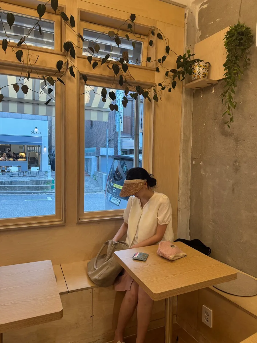 View of drinks and dessert from the seat at Sese Coffee