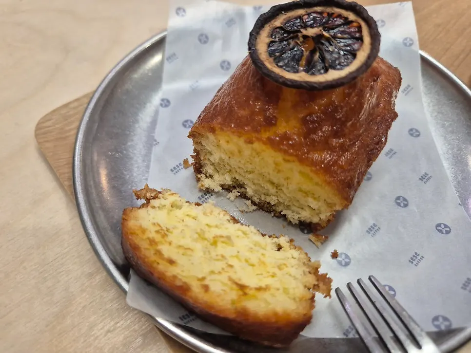 Cross-section of the pound cake showing lemon peel